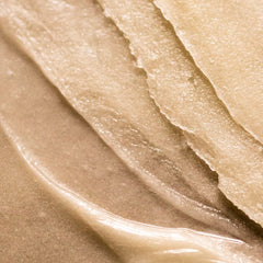 Summer Fridays Babymoon Belly Balm texture swatch on skin demonstrates rich moisture.