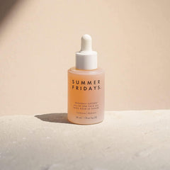 Dropper pouring Heavenly Sixteen Face Oil showing easy dosing for soft skin