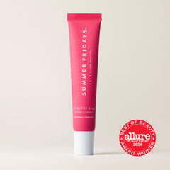 Summer Fridays Pink Guava lip balm on lips showing sheer color.