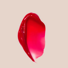 Summer Fridays Cherry swatch reveals a soft red glow and conditioning feel.