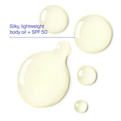 Supergoop! Glow Oil being applied to forearm for radiant hydration.