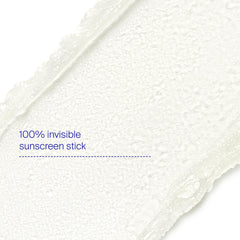 Supergoop Unseen Sunscreen Stick applied on face over makeup for smooth glide