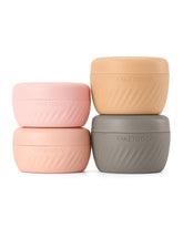 TakeToday travel containers 2oz apricot front view for compact, TSA-friendly cosmetic storage.