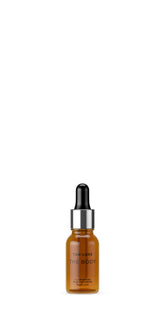 Tan-Luxe The Body Illuminating Drops bottle showcases customizable glow for your skin.