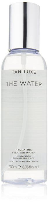 TAN-LUXE The Water bottle ready for hydrating self-tan application for a natural glow.