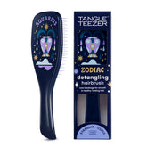 Tangle Teezer Aquarius Zodiac detangler on wet hair for knot-free styling.