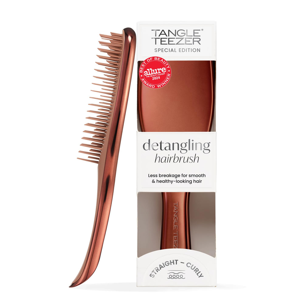 Tangle Teezer Chrome Ultimate Detangler close-up shows the chrome finish and smooth detangling