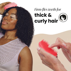 Thick curly hair with Tangle Teezer detangler, showcasing firm-flex teeth for easy detangling.