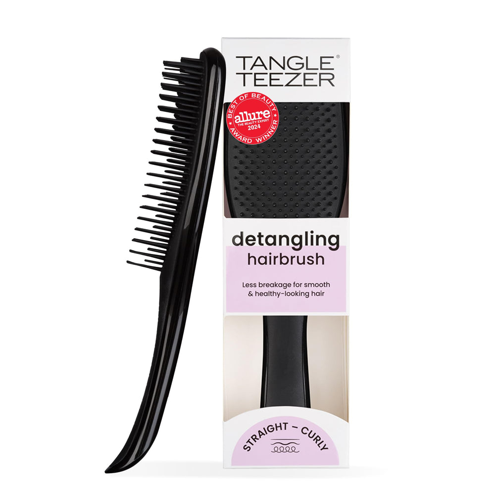 Tangle Teezer Ultimate Detangler brush on wet hair for knot-free detangling.