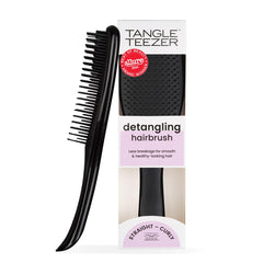 Tangle Teezer Ultimate Detangler brush on wet hair for knot-free detangling.