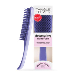 Tangle Teezer Ultimate Detangler teeth closeup for gentle knot removal on all hair types.