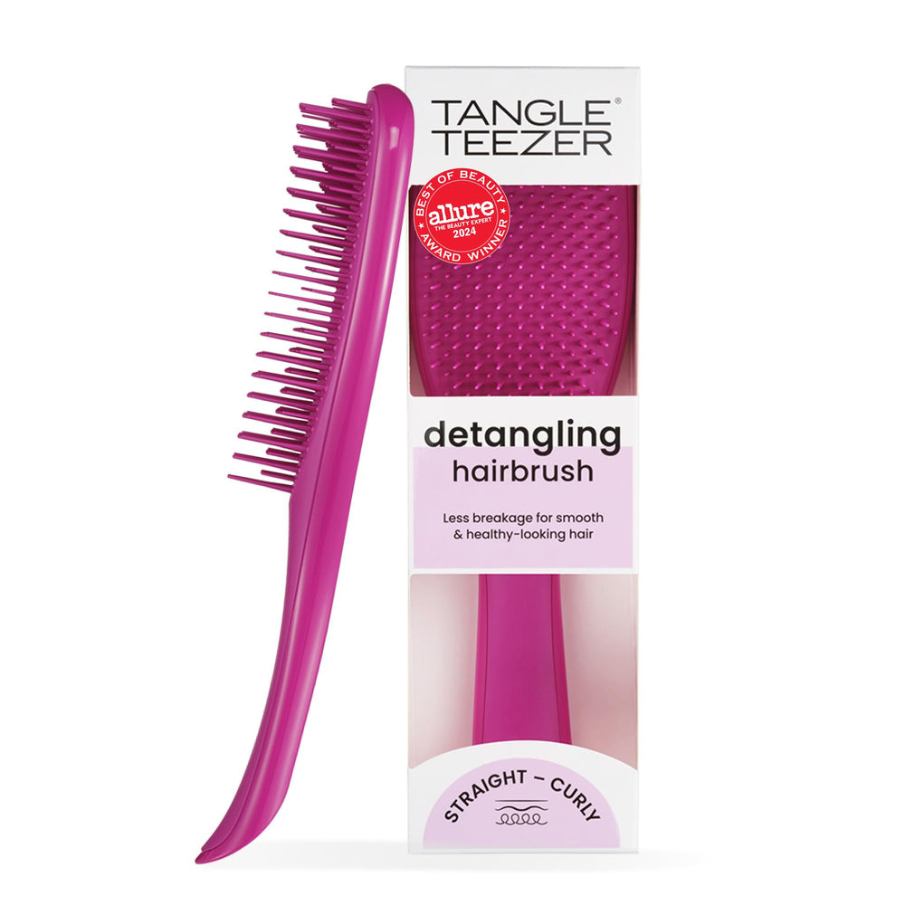 Tangle Teezer Ultimate Detangler in electric raspberry offers knot-free glide on wet hair.