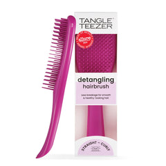 Tangle Teezer Ultimate Detangler in electric raspberry offers knot-free glide on wet hair.
