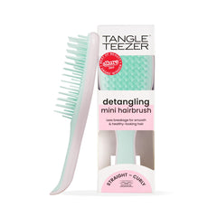 Tangle Teezer Ultimate Detangler closeup showing dual-teeth design for gentle detangling.