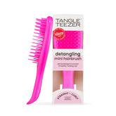 Tangle Teezer Ultimate Detangler travel mini pink brush for on-the-go detangling.