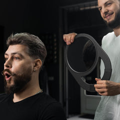 TASALON hand mirror with anti-slip rubber grip provides secure handling during makeup or shaving.