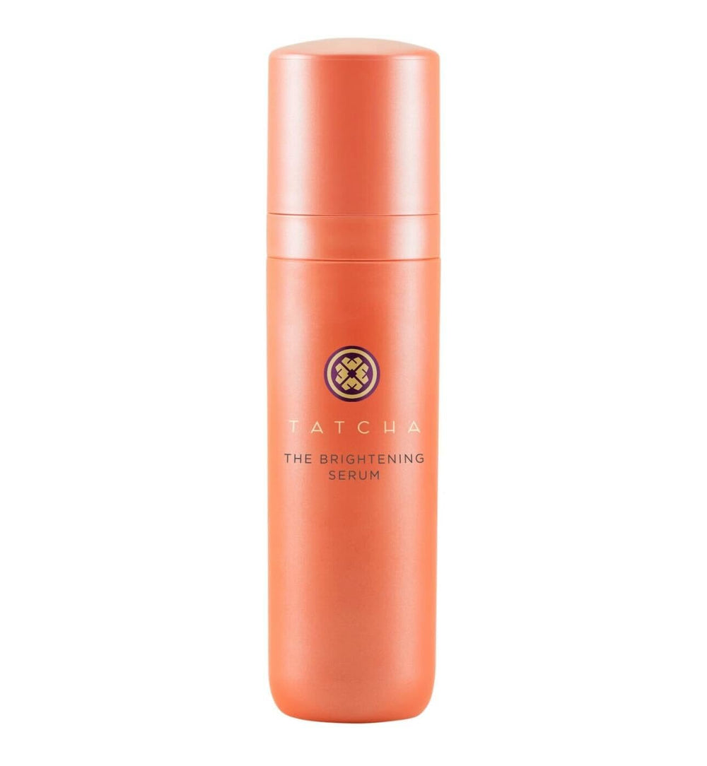 TATCHA Brightening Serum bottle closeup highlighting time-release vitamin C benefits.