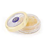TATCHA Camellia Gold Spun Lip Balm packaging conveys premium hydration