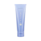 TATCHA Rice Wash bottle pour shows gentle cleanse and smooth skin prep.