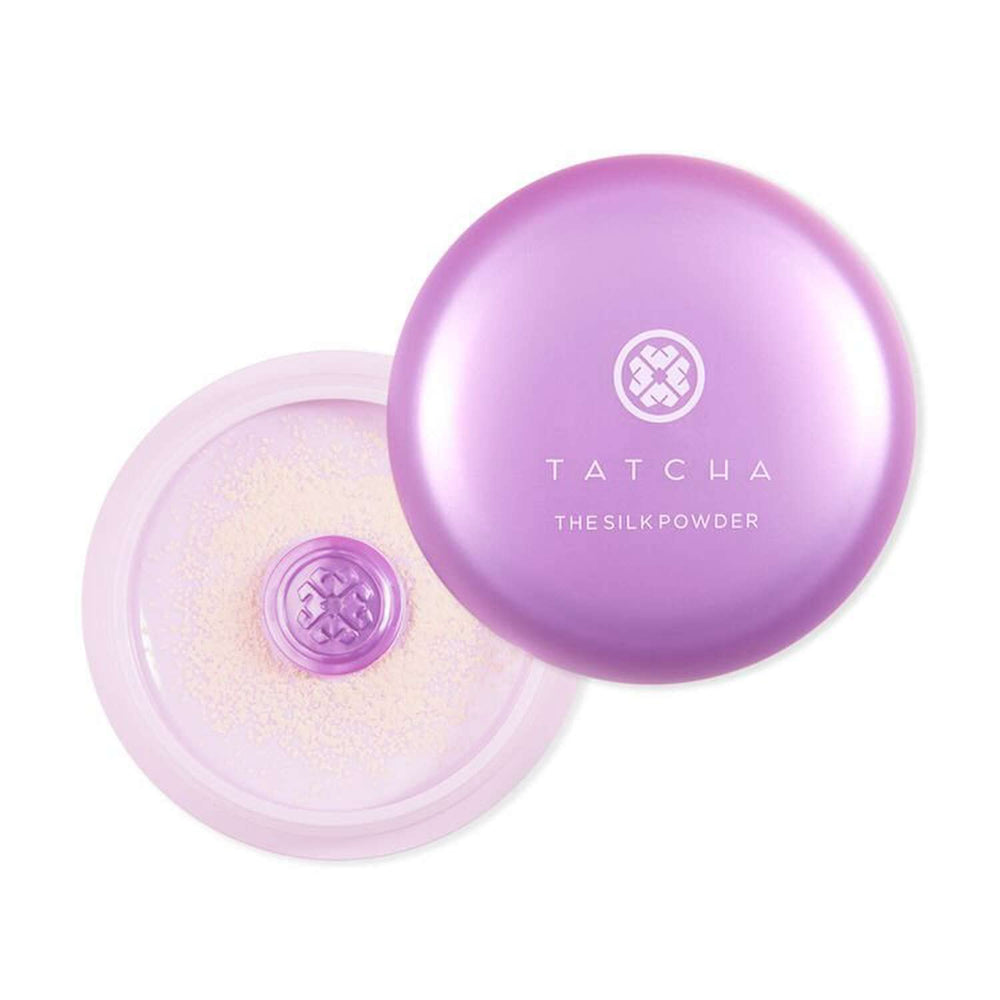 TATCHA Silk Powder bottle closeup—talc-free setting for lasting makeup and a soft glow.