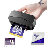 TATTMUSE TP32 palm-size printer on a desk highlighting portability for mobile tattoo work