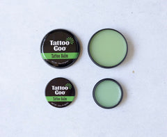Tattoo Goo travel-size balm tin for on-the-go aftercare.