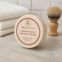 Taylor of Old Bond Street sandalwood shaving cream bowl open showing rich lather ready for brush