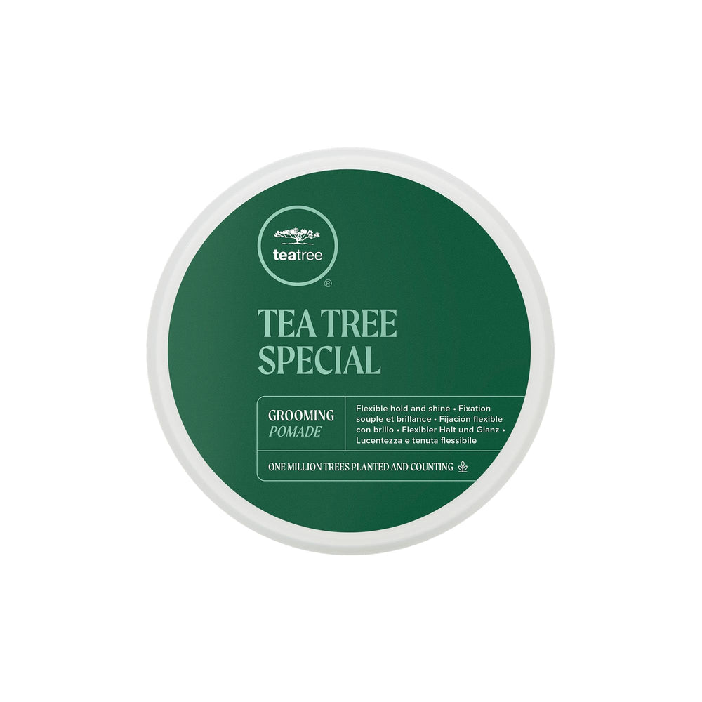 Tea Tree Grooming Pomade jar front shows flexible hold for defined waves and shine.