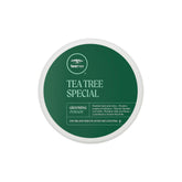 Tea Tree Grooming Pomade jar front shows flexible hold for defined waves and shine.