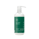 Tea Tree Hair & Scalp Treatment bottle showcases hydrating formula for all hair types, nourishes strands