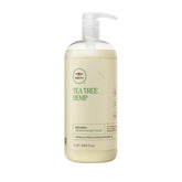 Tea Tree Hemp Restoring Shampoo bottle-front shows a hemp-infused cleanse for all hair types.