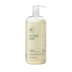 Tea Tree Hemp Restoring Shampoo bottle-front shows a hemp-infused cleanse for all hair types.