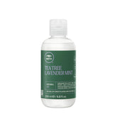 Tea Tree Lavender Mint Defining Gel bottle highlights lightweight curl definition and frizz control.