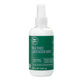 Tea Tree Lavender Mint Conditioning Leave-In Spray bottle demonstrates lightweight hydration for dry, coarse hair.