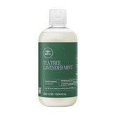 Tea Tree Lavender Mint Moisturizing Shampoo bottle shows hydrating formula for dry hair.