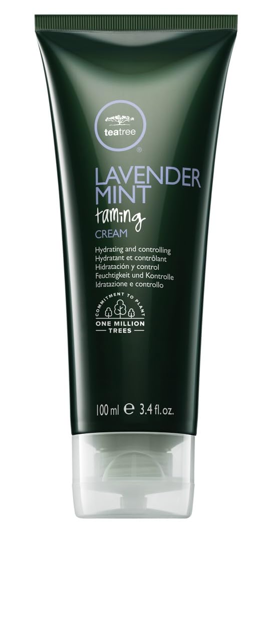 Tea Tree Lavender Mint Taming Cream bottle pour showcasing frizz control.