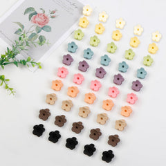 TEBIEKOY colorful flower clips closeup highlights cheerful design for playful hairstyles.