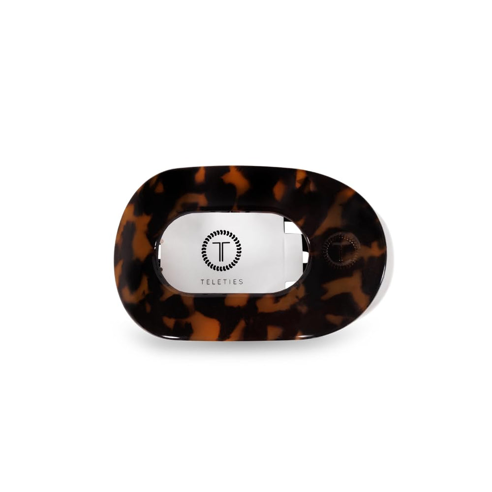 Teleties flat round clip closeup highlights durable, nearly unbreakable construction