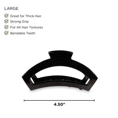 Teleties large open claw clip jet black worn in hair for styling.