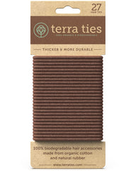 Terra Ties brown biodegradable hair tie securing a ponytail with no crease.