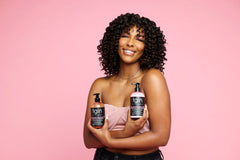 Tgin acai berries close-up signals nourishing antioxidants for hair health.