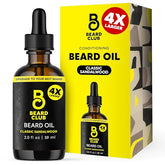 The Beard Club beard oil classic sandalwood bottle pour for premium hydration.