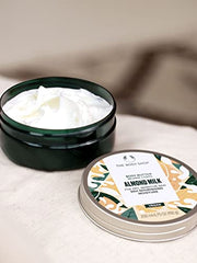 The Body Shop Almond Milk Body Butter being massaged into dry skin during routine