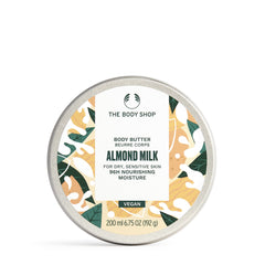 The Body Shop Almond Milk Body Butter jar closeup shows rich nourishing texture for dry skin