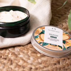 The Body Shop Argan Body Butter application—non-sticky, deeply nourishing moisturization.