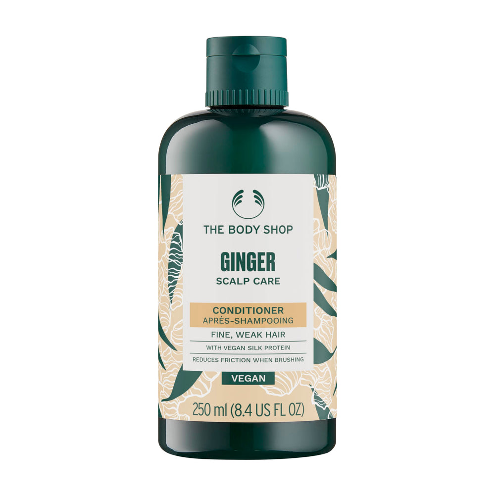 The Body Shop Ginger Scalp Care Conditioner bottle front with vegan formula for scalp soothing.
