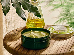 The Body Shop hemp butter jar close-up highlights Ghana-sourced shea butter for soft, soothed skin.