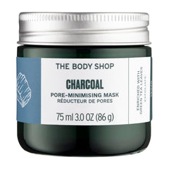 The Body Shop Himalayan Charcoal Purifying Glow Mask jar showing creamy clay for purifying glow