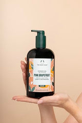 The Body Shop Pink Grapefruit Shower Gel label close-up showcases vegan-certified ingredients.