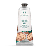 The Body Shop Shea Hand Balm application closeup showing quick-absorb gel-cream for dry hands